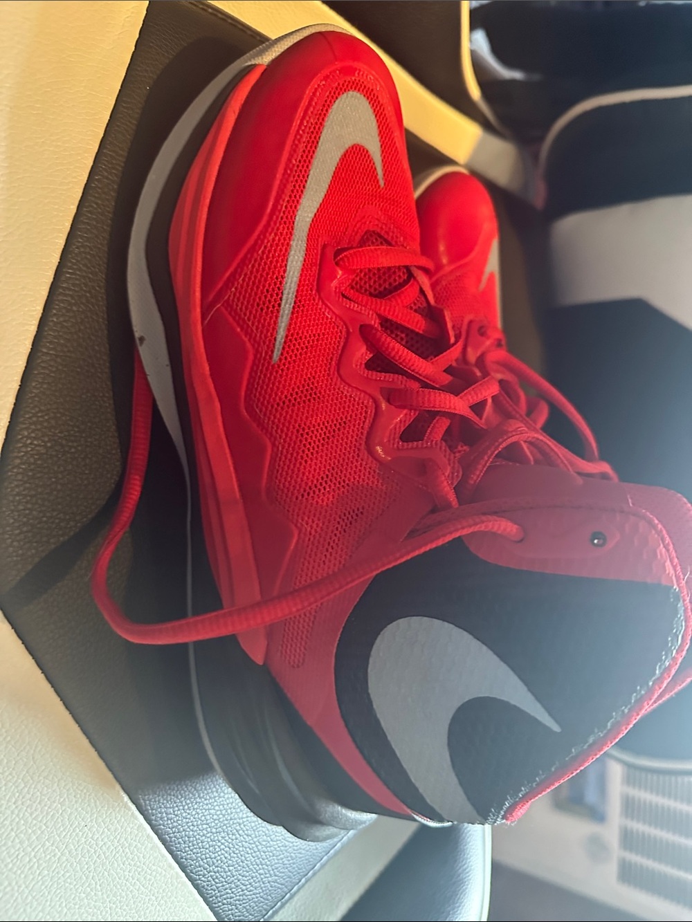 Nike Red Basketball Sneakers with Silver Swoosh Accent